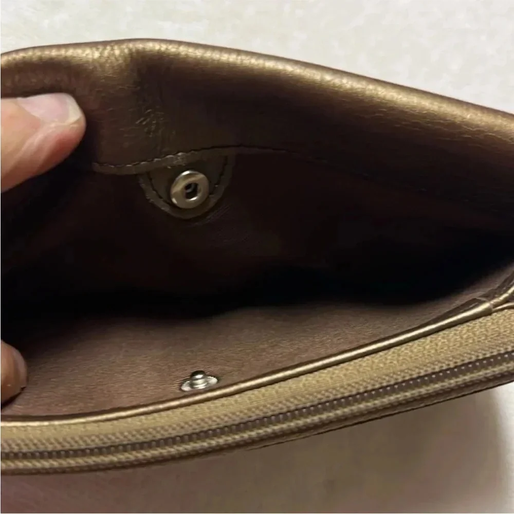 Fossil metallic bronze pleated leather zip wallet